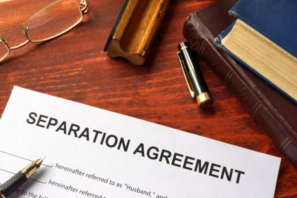 Trimnal & Myers, separation agreement form on office table